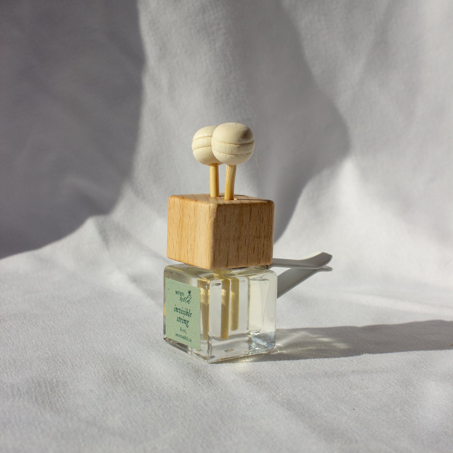Invisible String | pink pepper, tobacco, + vanilla